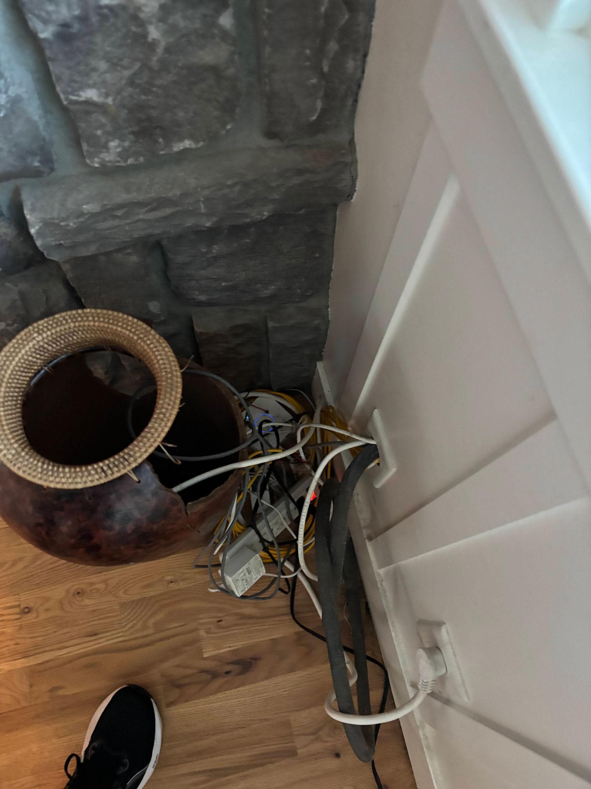 This disaster is where we thought the cute bookcase was. Instead there was a broken vase with wires hidden in it.
