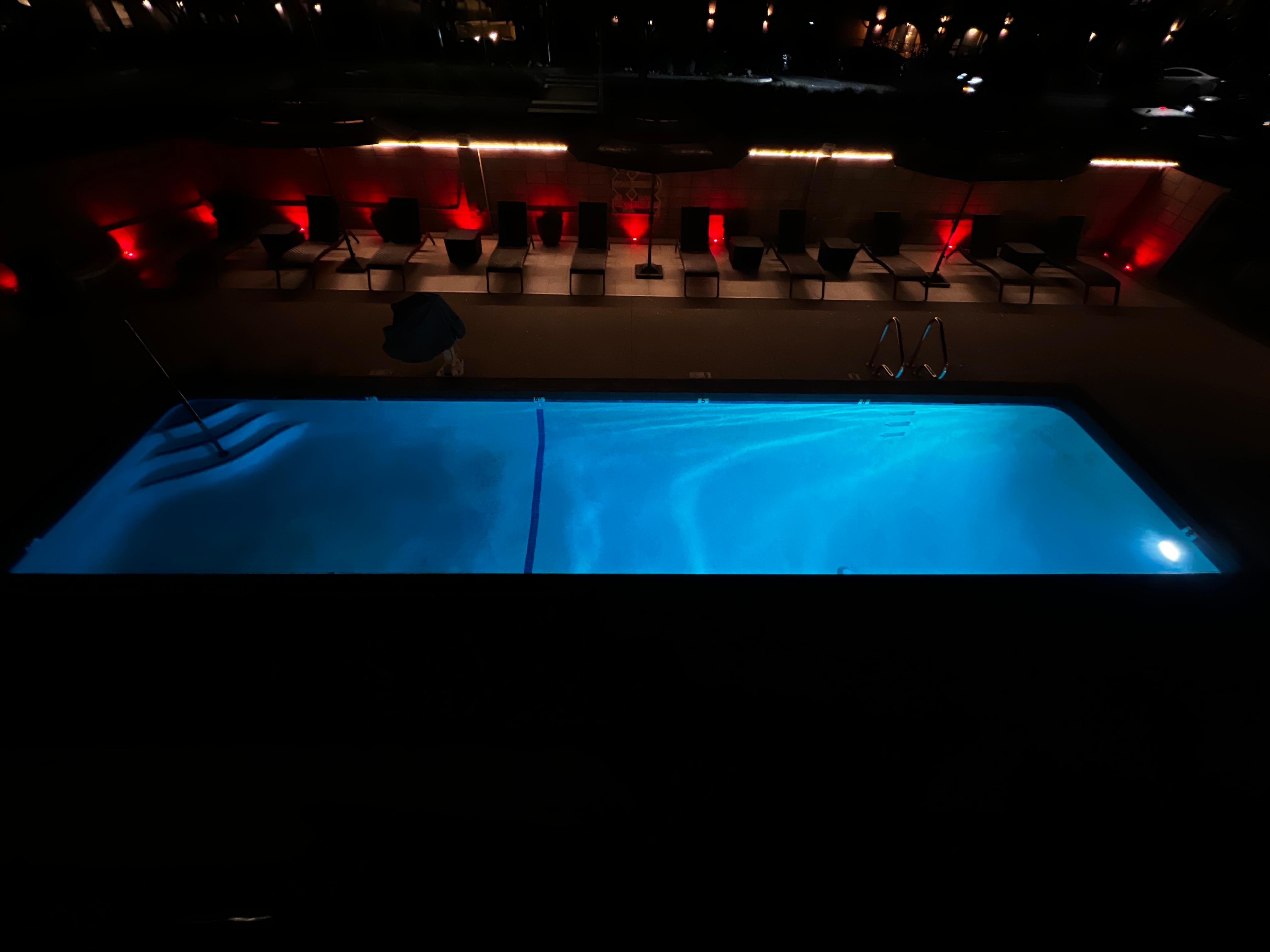 view of the pool at night