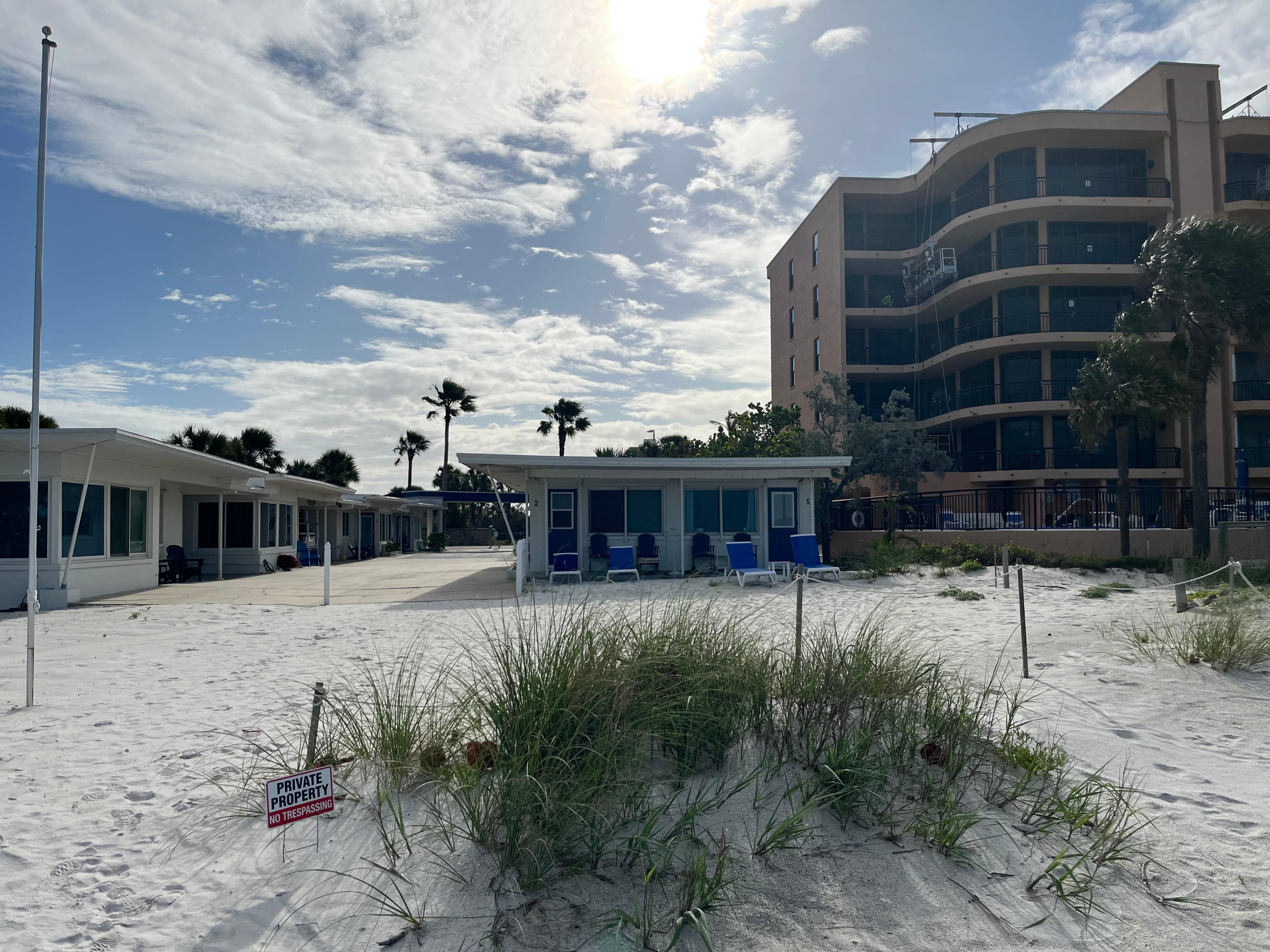 You get one half of the small building on the left. Plenty of room for 2, would be ok for 4