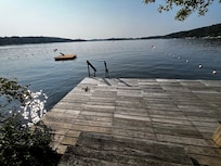Dock & raft at the end of the street-400-500 feet from house. Tiny beach is to left out of view.