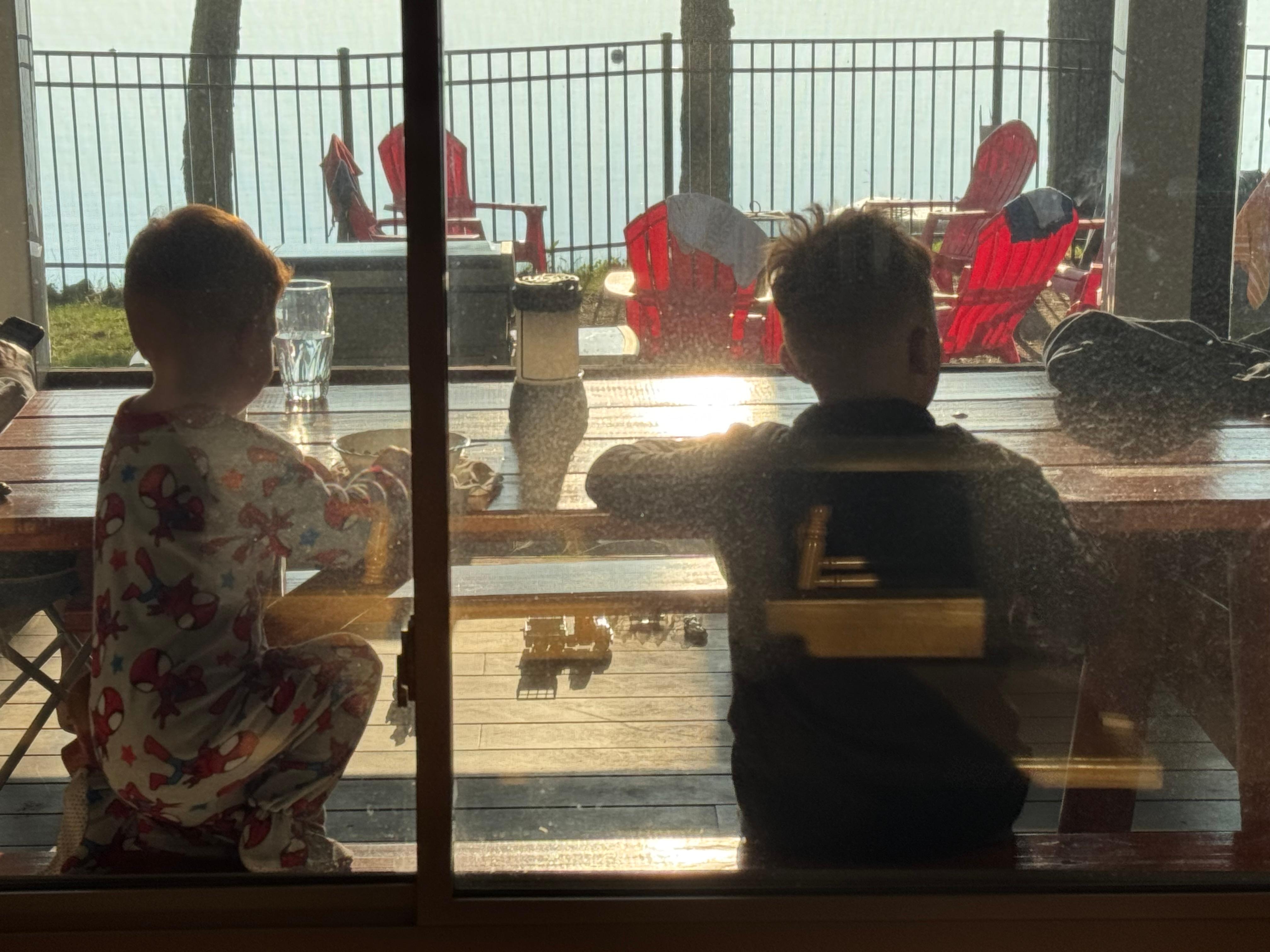 Our boys enjoying breakfast on the screened in porch on another perfect morning.