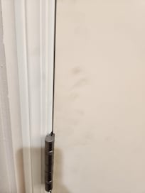 Dirty hand prints on bathroom door