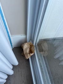 Trash at patio doors