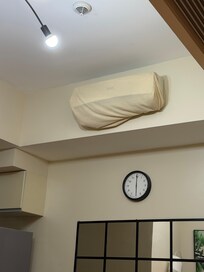 One of the ac unit is covered.
