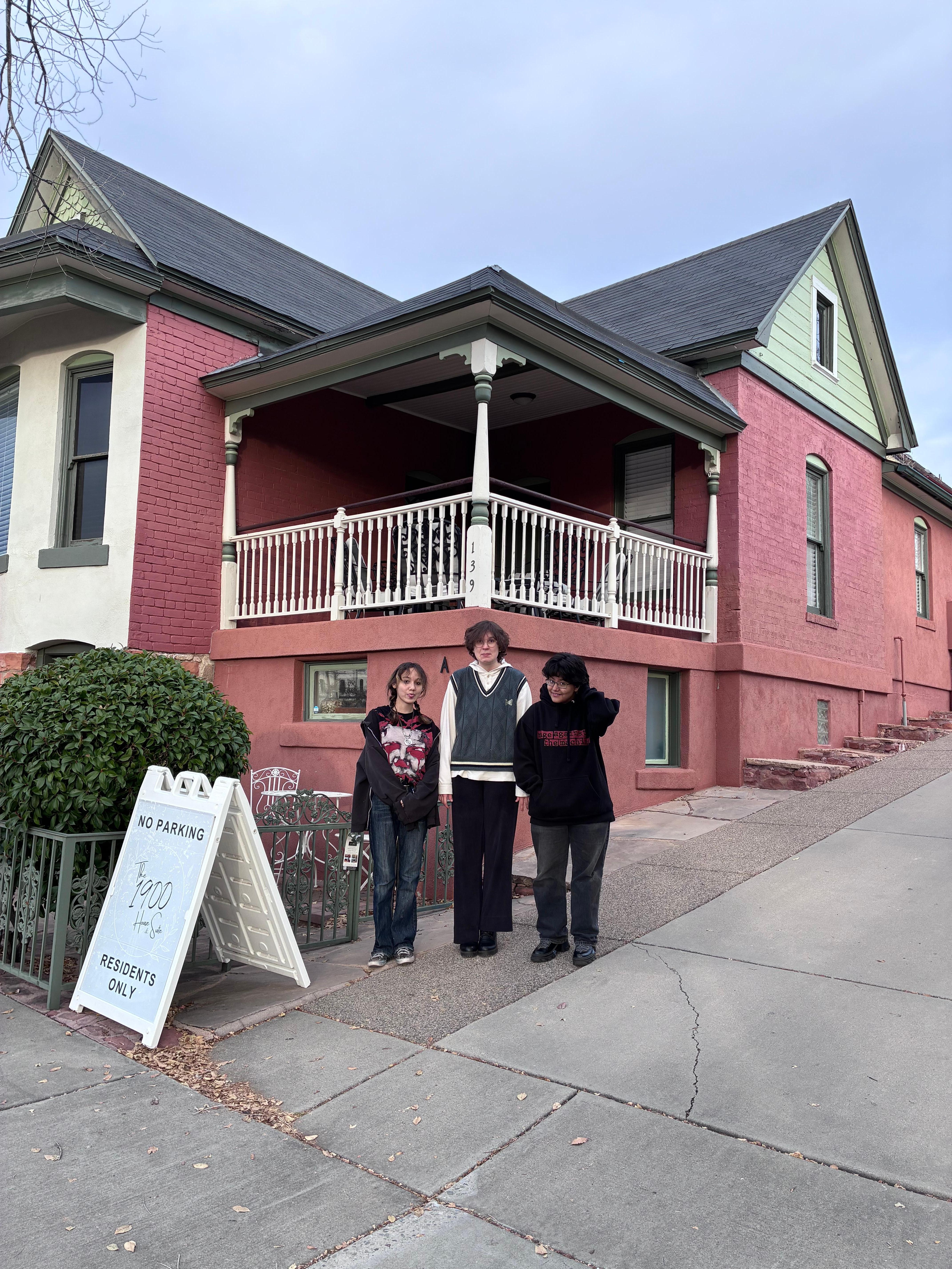 My granddaughter and her friends in front of the 1900 house.
