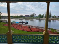 View of the river from the back door with a part view of the back deck railing.