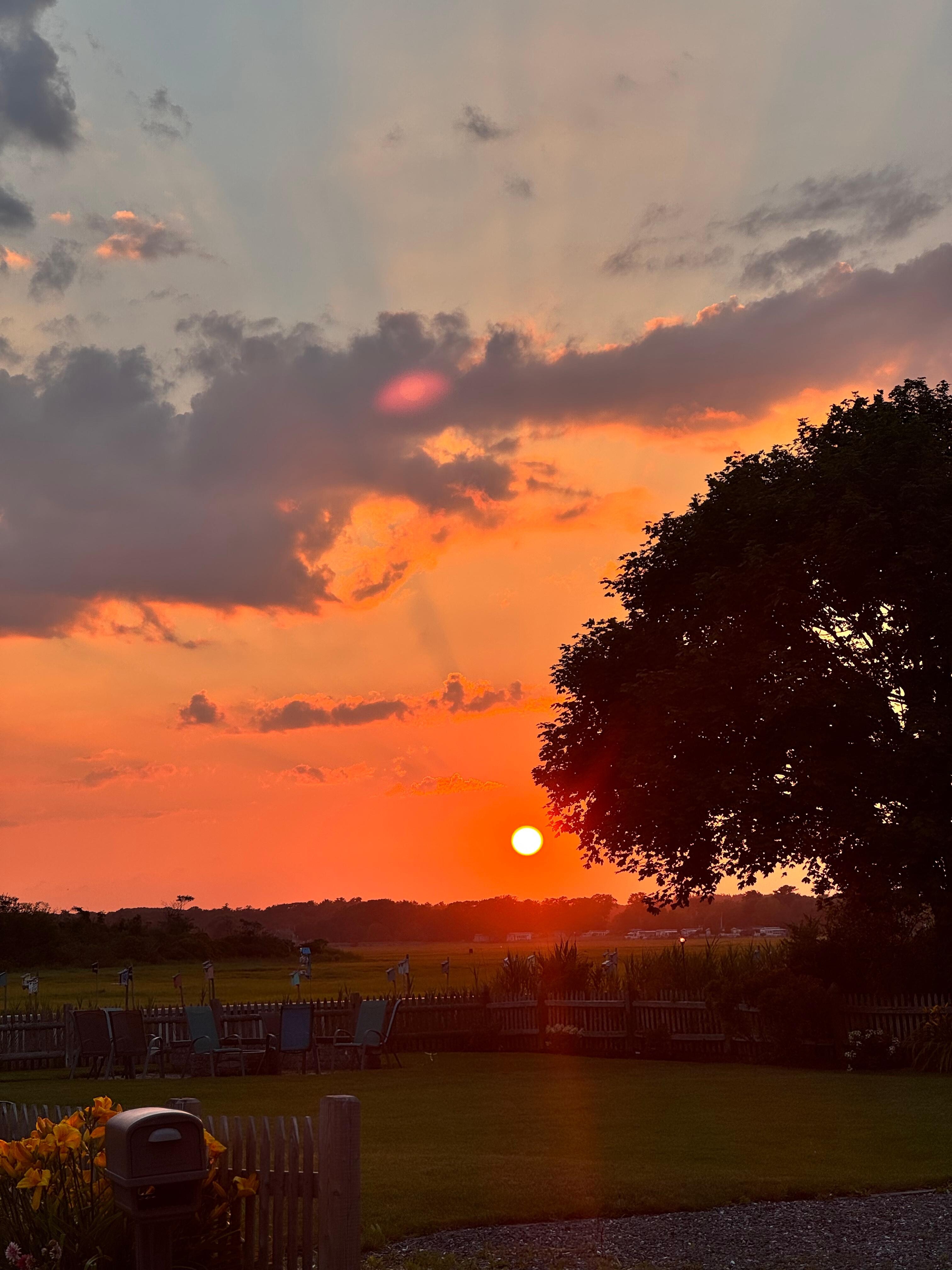 Sunset over marsh from the front of the house