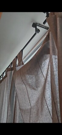 See through curtains. Curtain rod that falls when u move the curtains