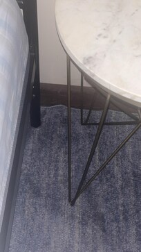 All behind the bed was very dusty/dirty