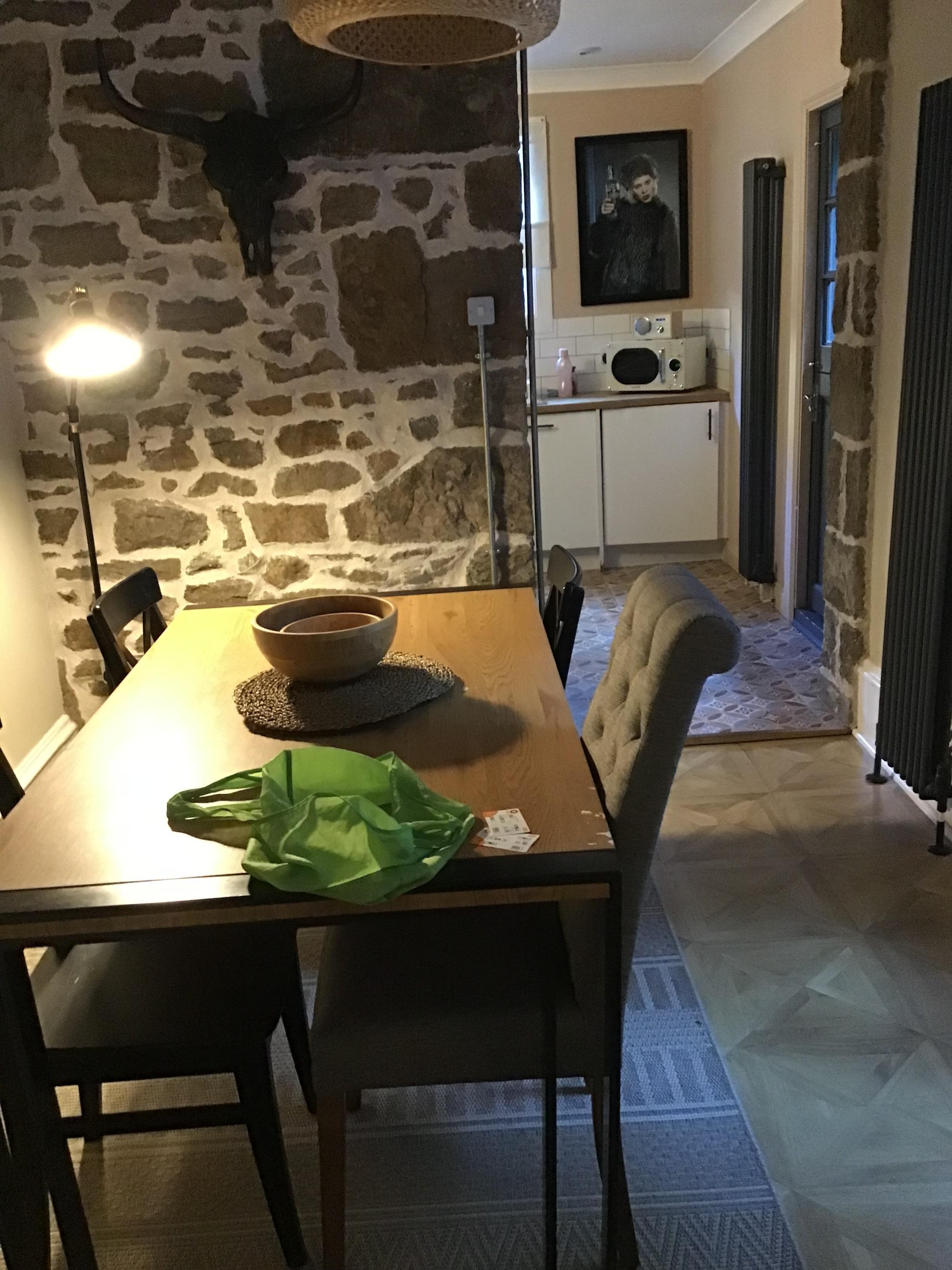 Dining room with the kitchen behind