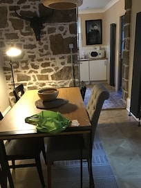 Dining room with the kitchen behind