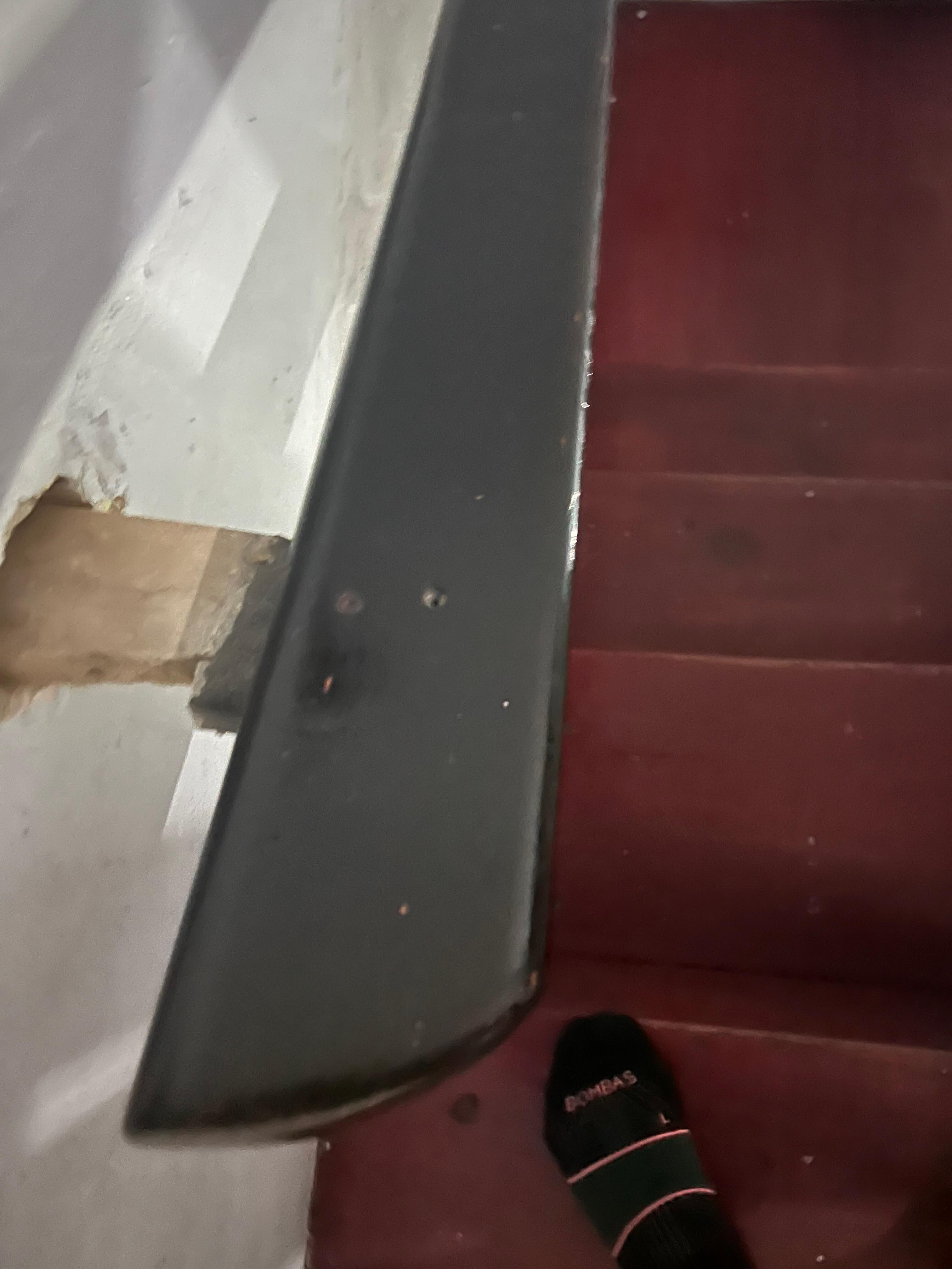 Handrail not attached to the wall. 
