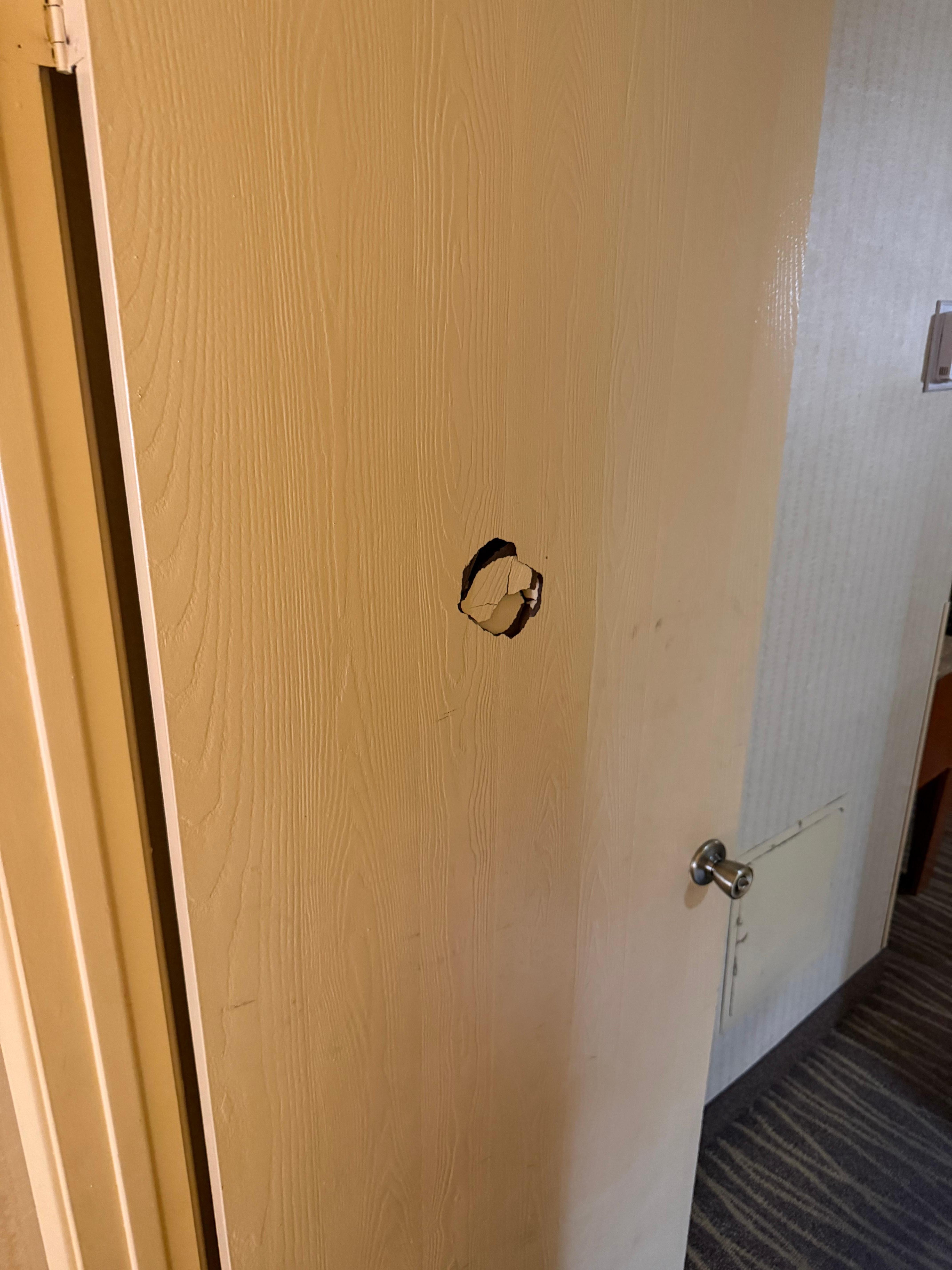 Hole in the bedroom door 