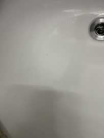 Sink with beard trimmings
