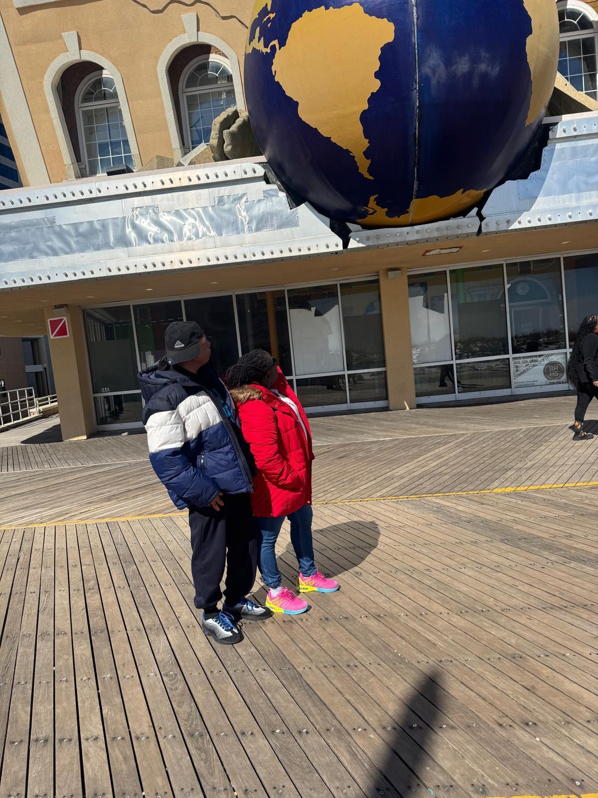 On the board walk  looking at this building  that  looks  like  it's  broken by earthquake 😳 