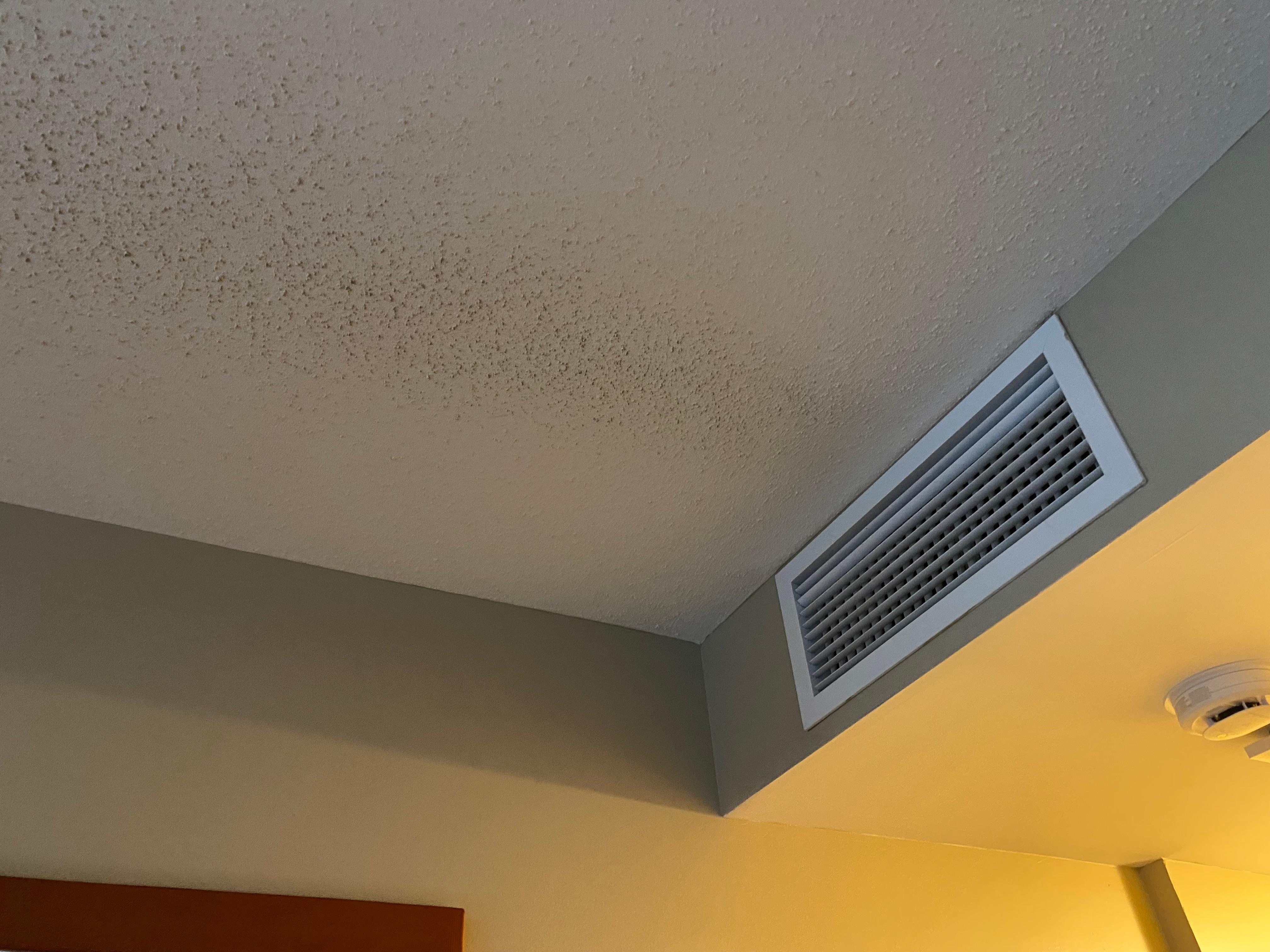 Stain from vent on ceiling. 