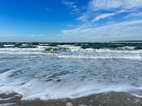 Beach feet away from property