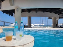 View sitting in a booth in the adult pool