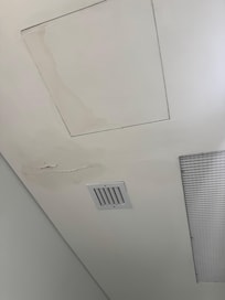 water stains and cracked tiles