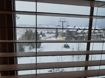 Amazing view of distant peaks from the kitchen window. Kicking Horse lift right outside.