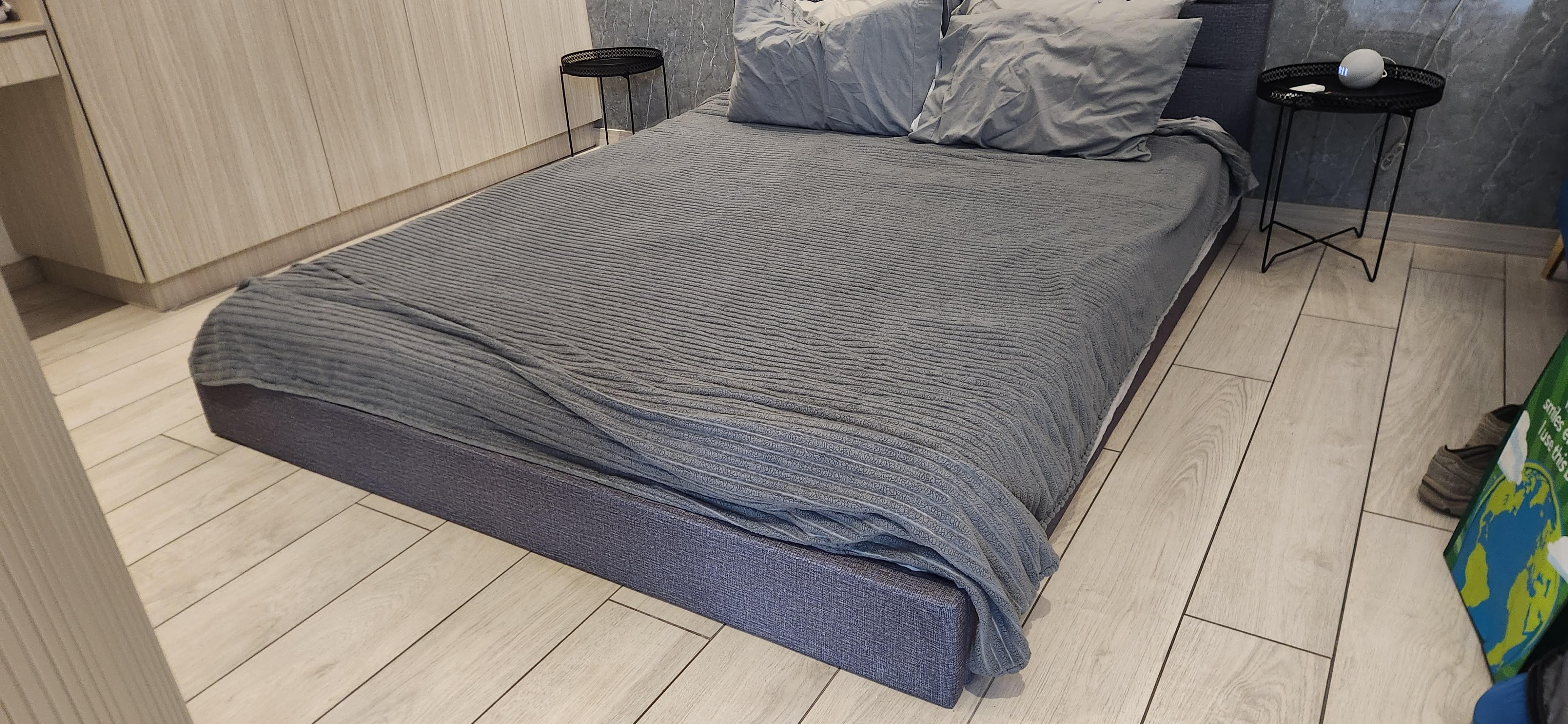 Mattress, no box springs, on floor.