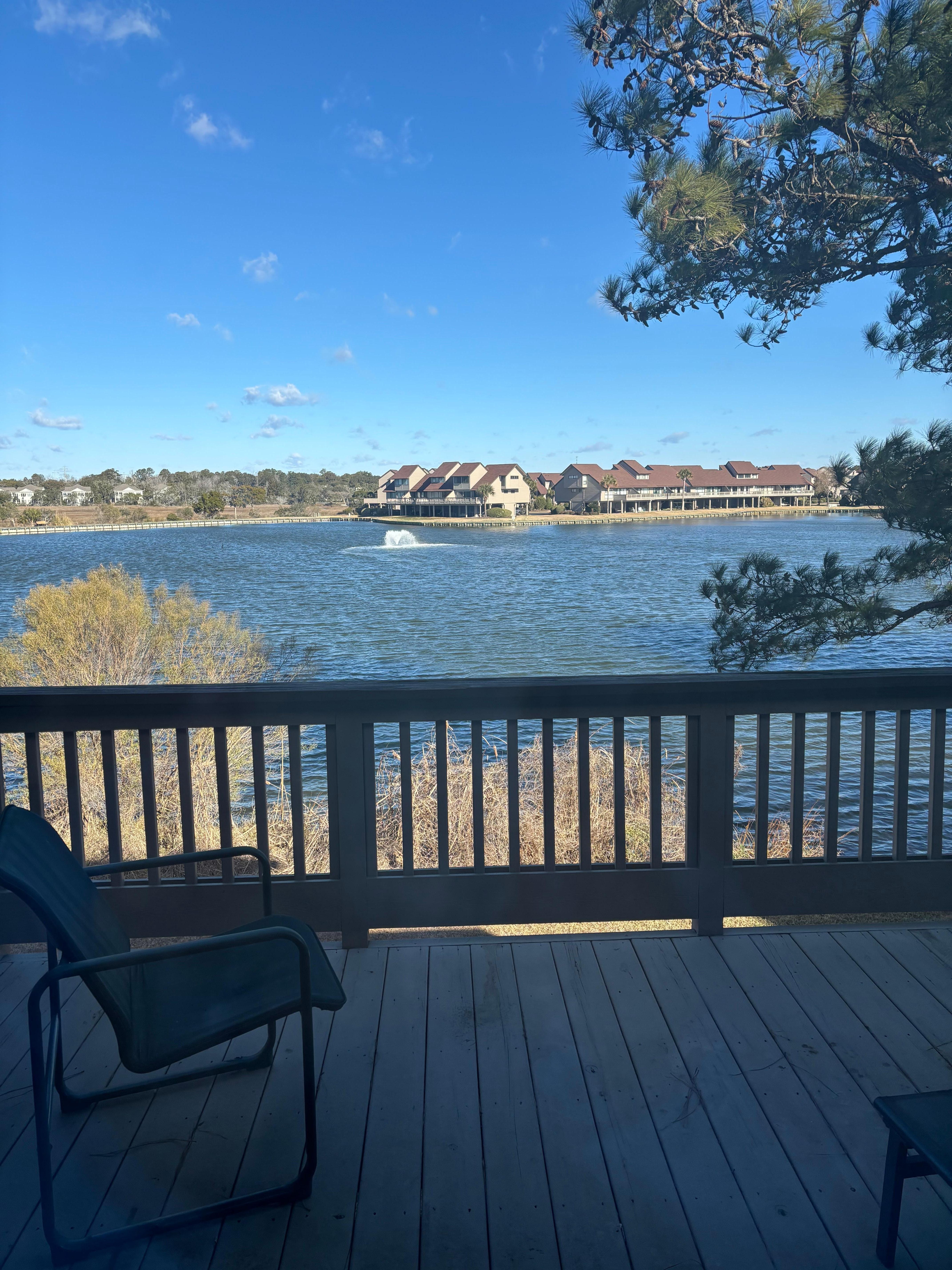 View from the deck. Fountain lighted at night. 