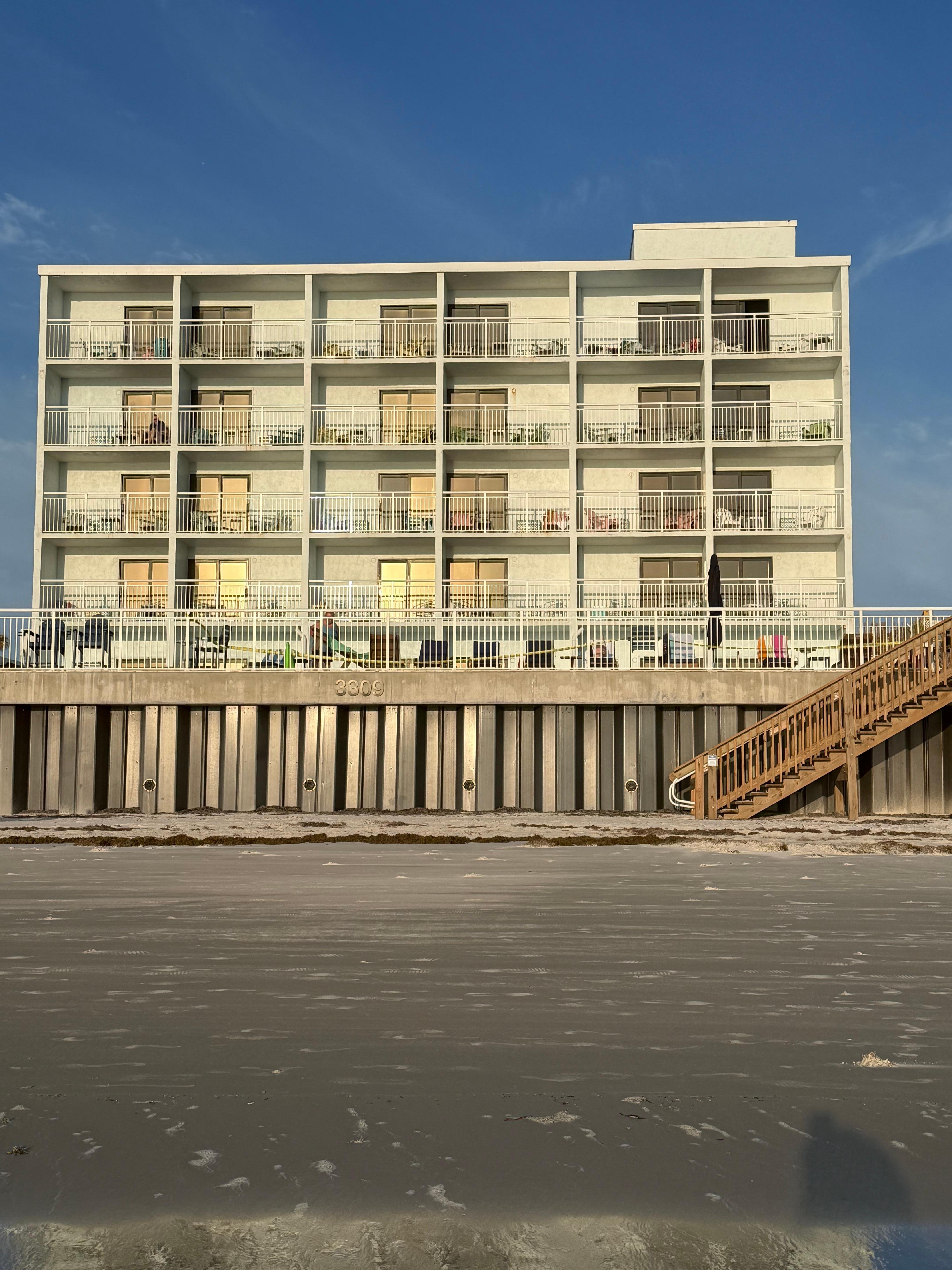 Beachside hotel view from the ocean. 