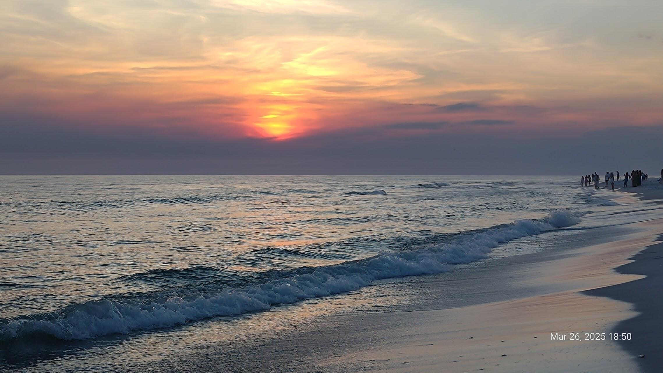 Walking the beach, sunset fading