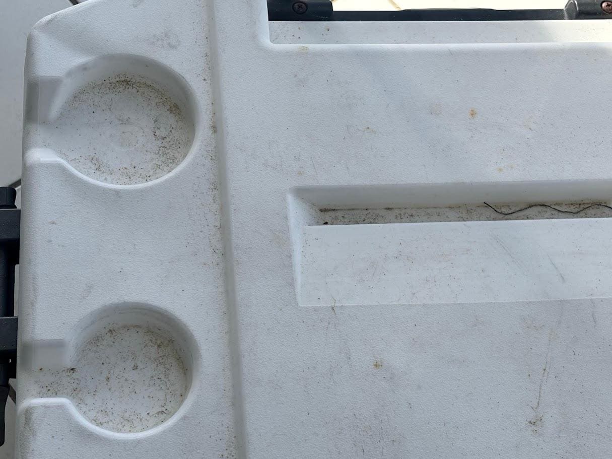 Ice Chest (Cooler) had sand and the inside had at least 4 inches of water.