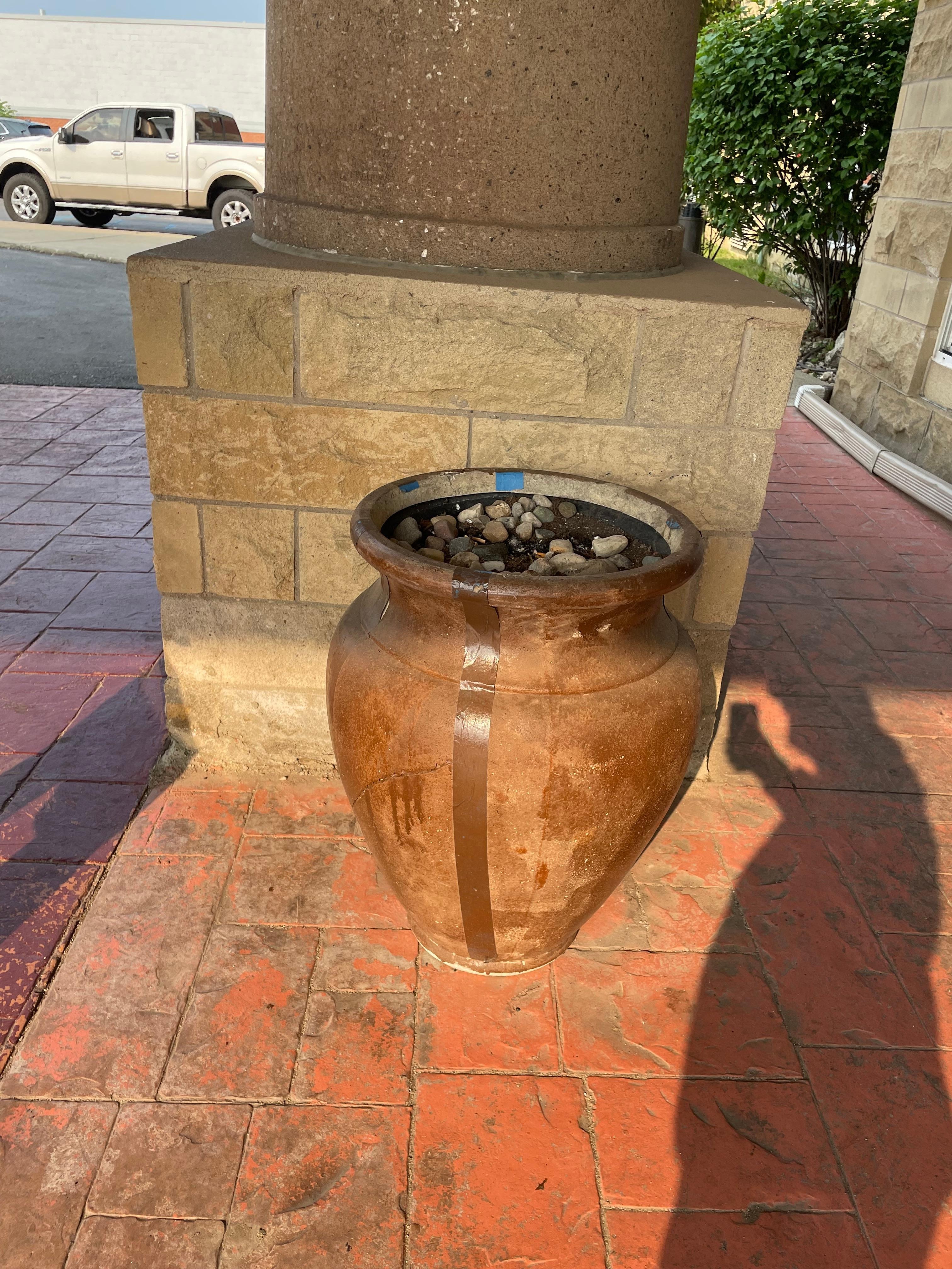 Broken poorly fixed pots