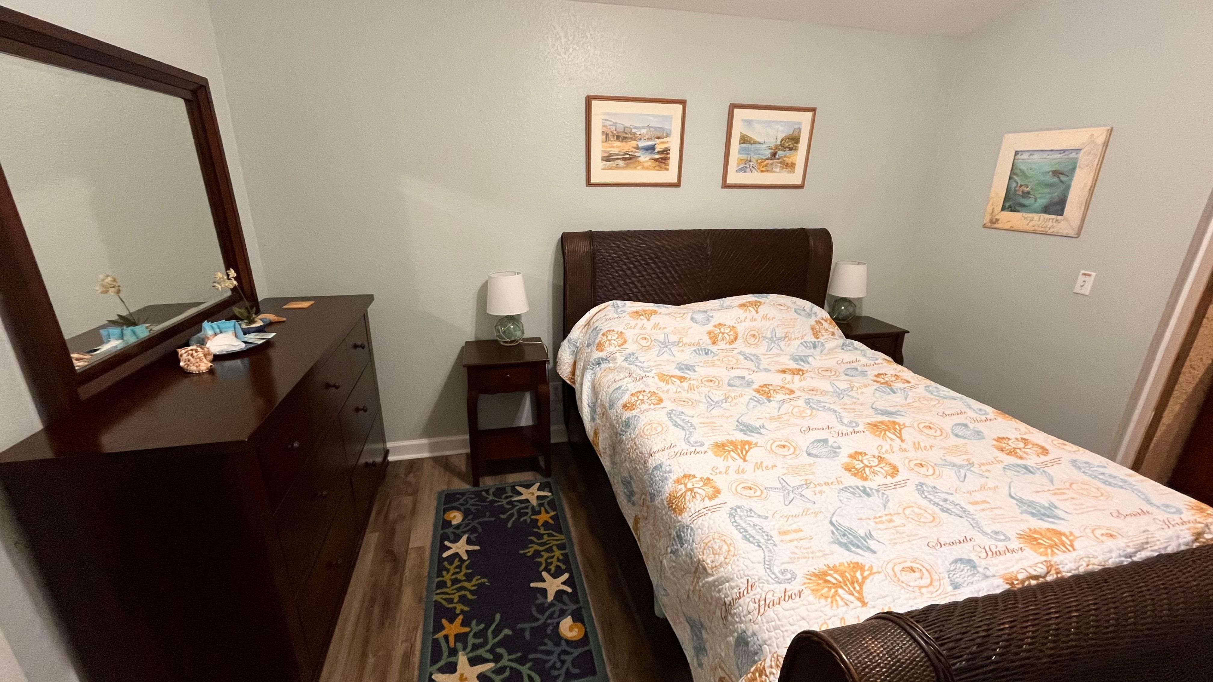 Great queen size bed.  (Camera angle makes it look small)