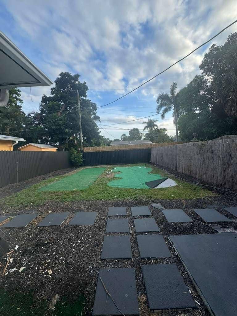 Mini golf course in backyard.