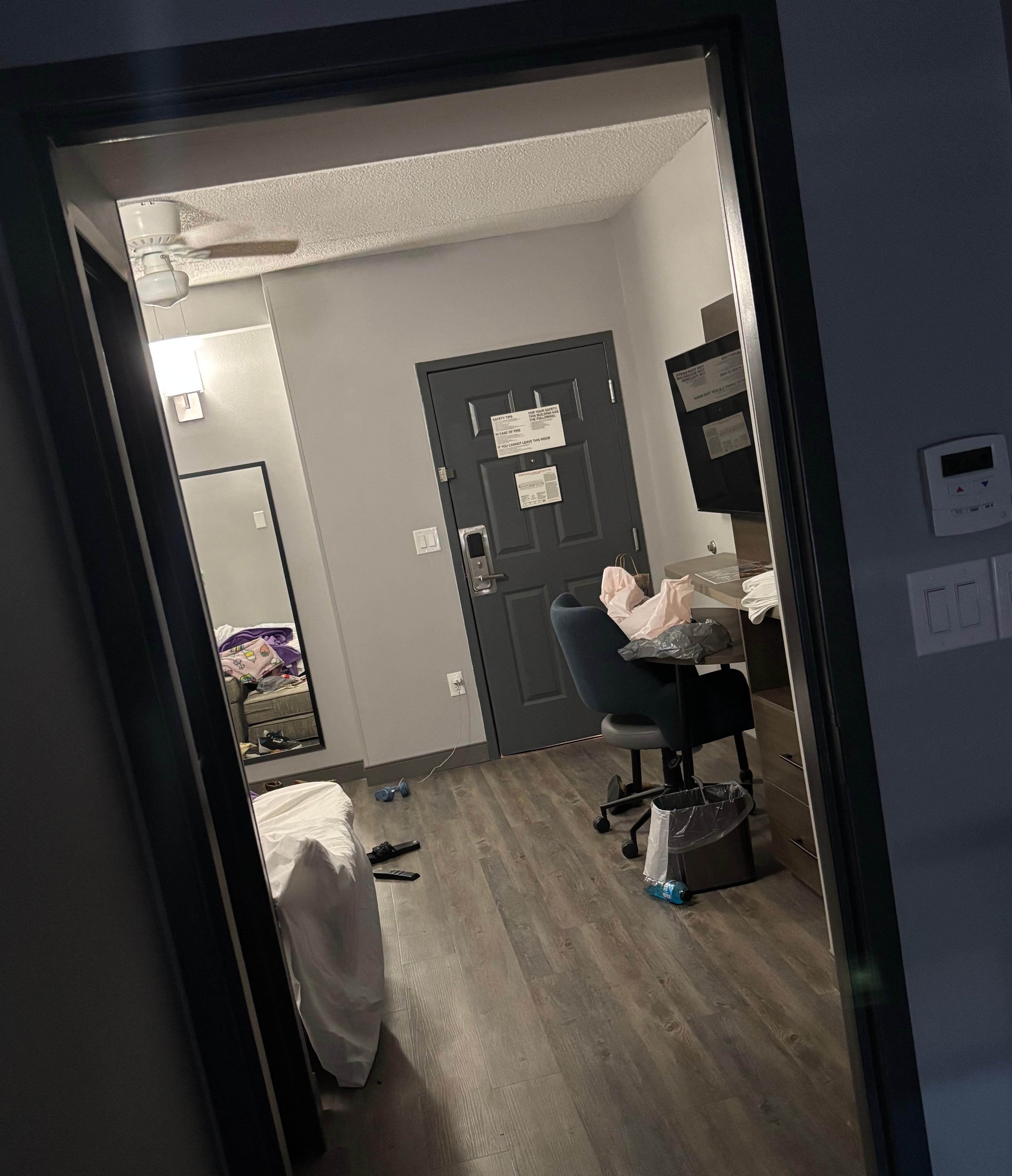 This is where the door should be, hinges there but no door. Separates the bedroom from living room area 