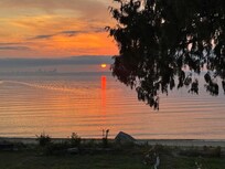 watching sunrise with seattle in the background