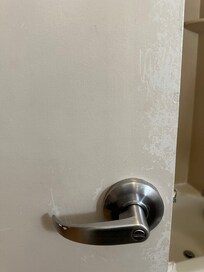 Paint coming off bathroom door