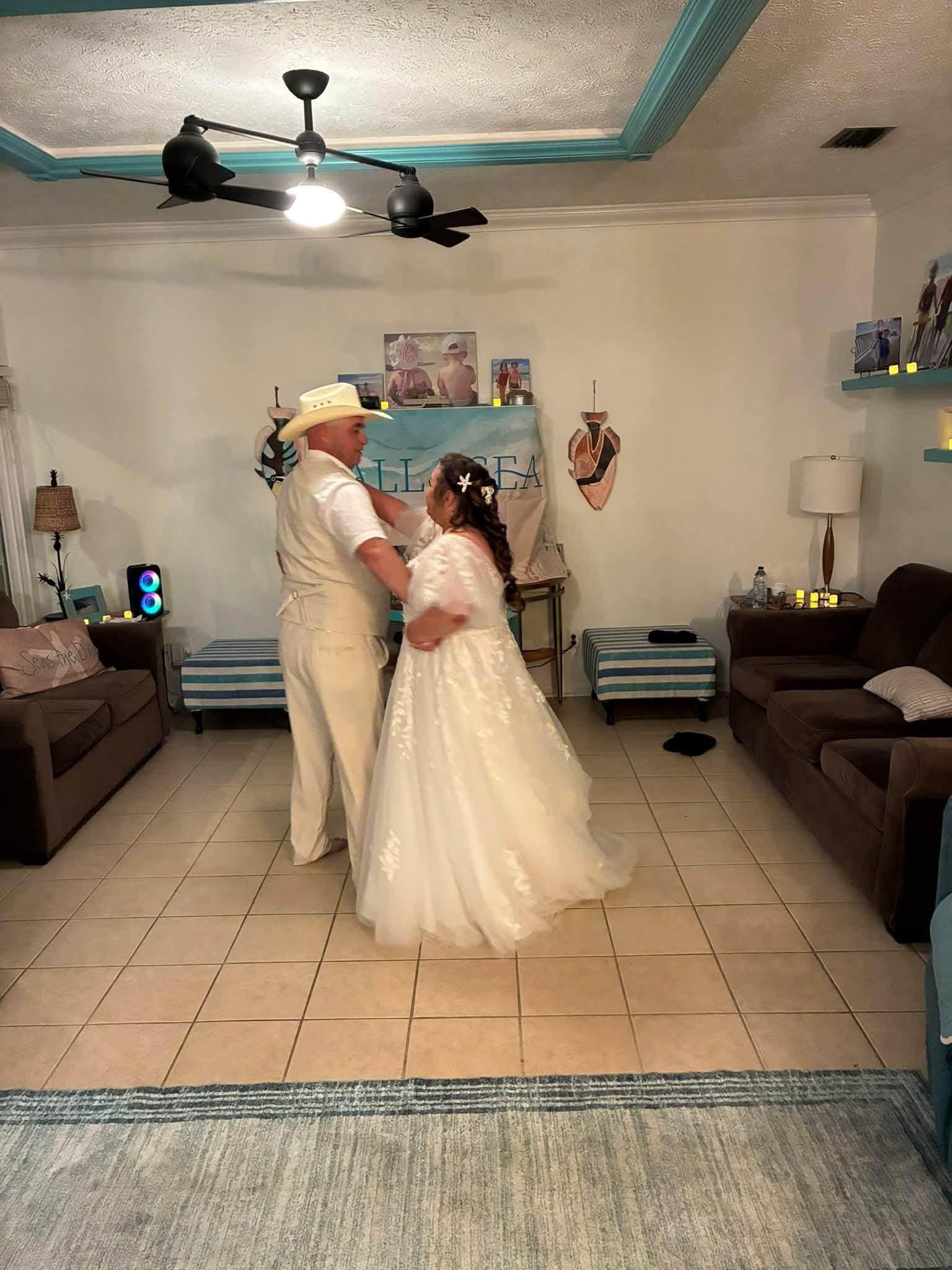 Living room area. We moved some stuff against the walls for our first dance.
