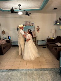 Living room area. We moved some stuff against the walls for our first dance.