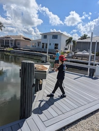 Kids fishing on dock