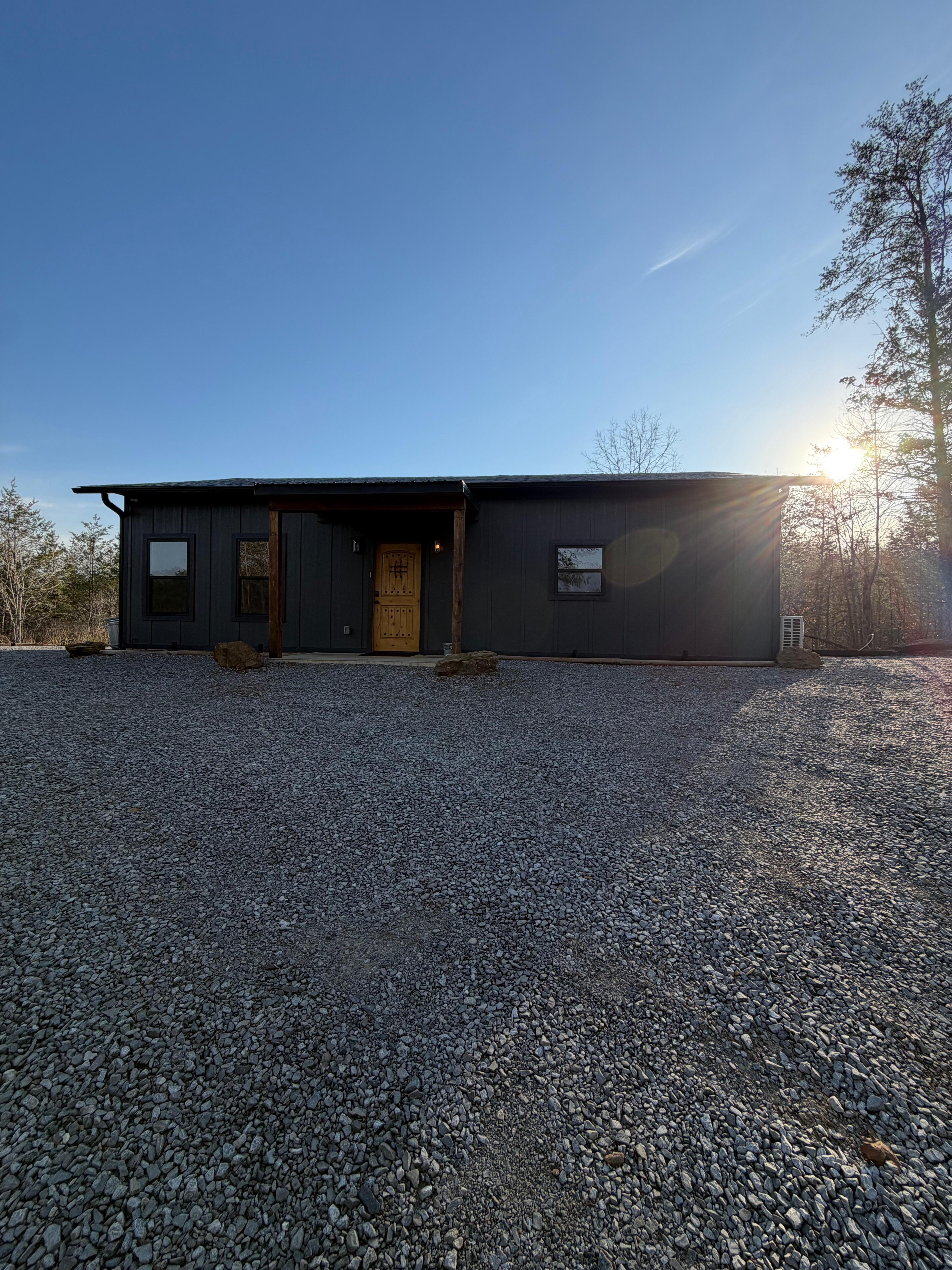 Once up the gravel hill, the first unit with fire pit & the trail to the right