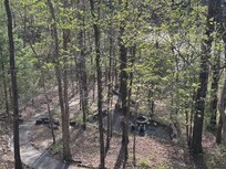 Looking down on walkway to boat ramp and lake from balcony