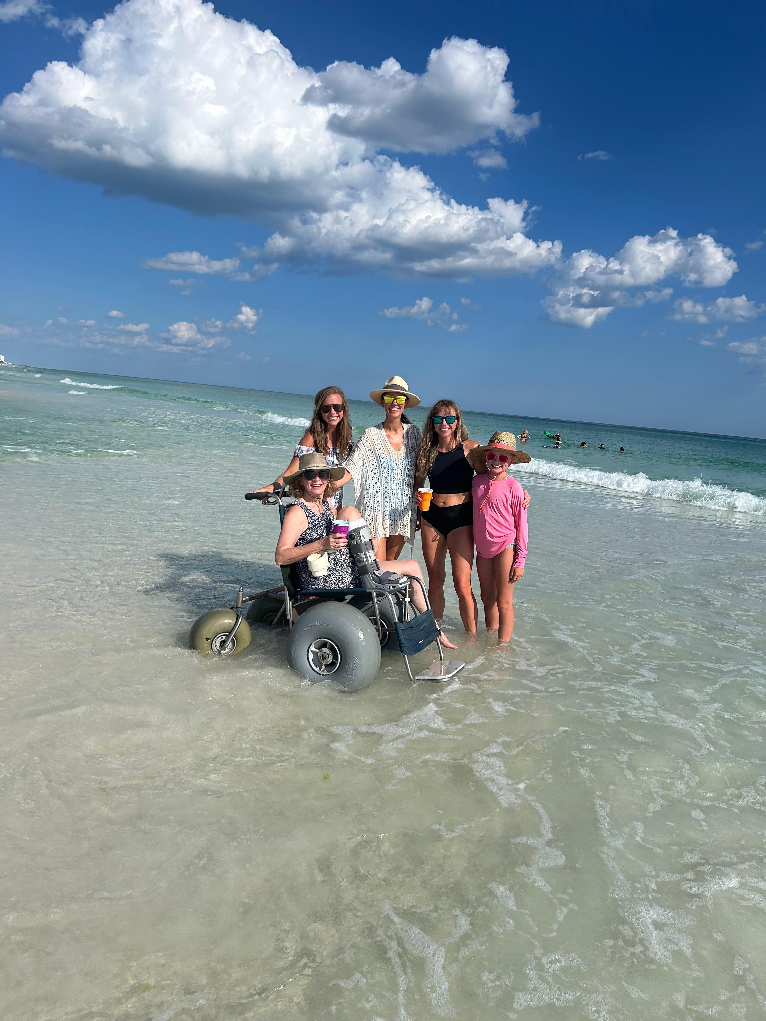 Can't let a broken foot spoil your beach fun