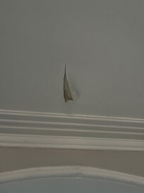 peeling paint in entry