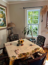 Seating for four, adjacent to main dining room table