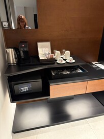 Minibar with coffee, tea, water, soft drinks, juice.
