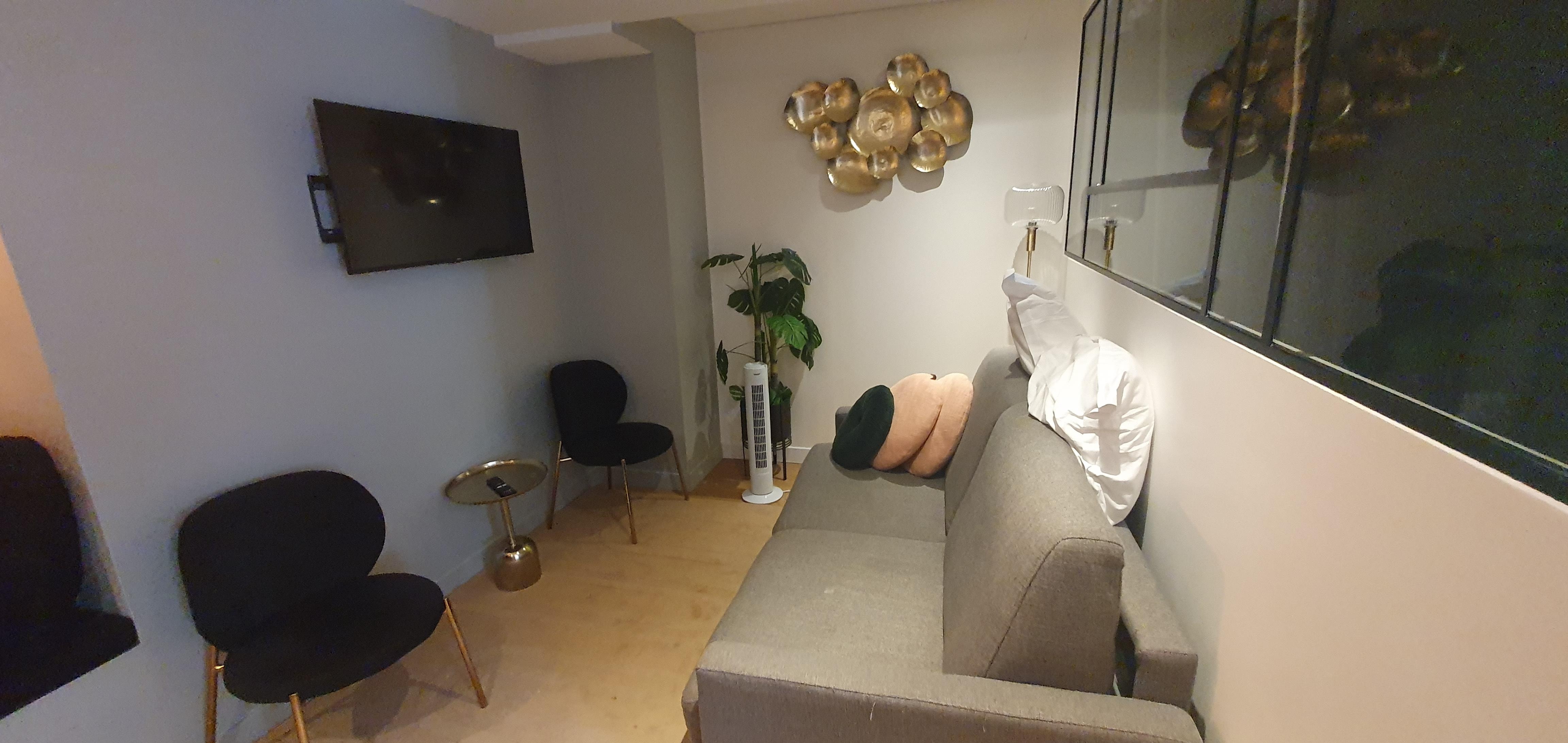 Tiny living room, filthy couch