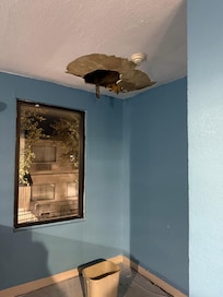 Huge hole in the ceiling.