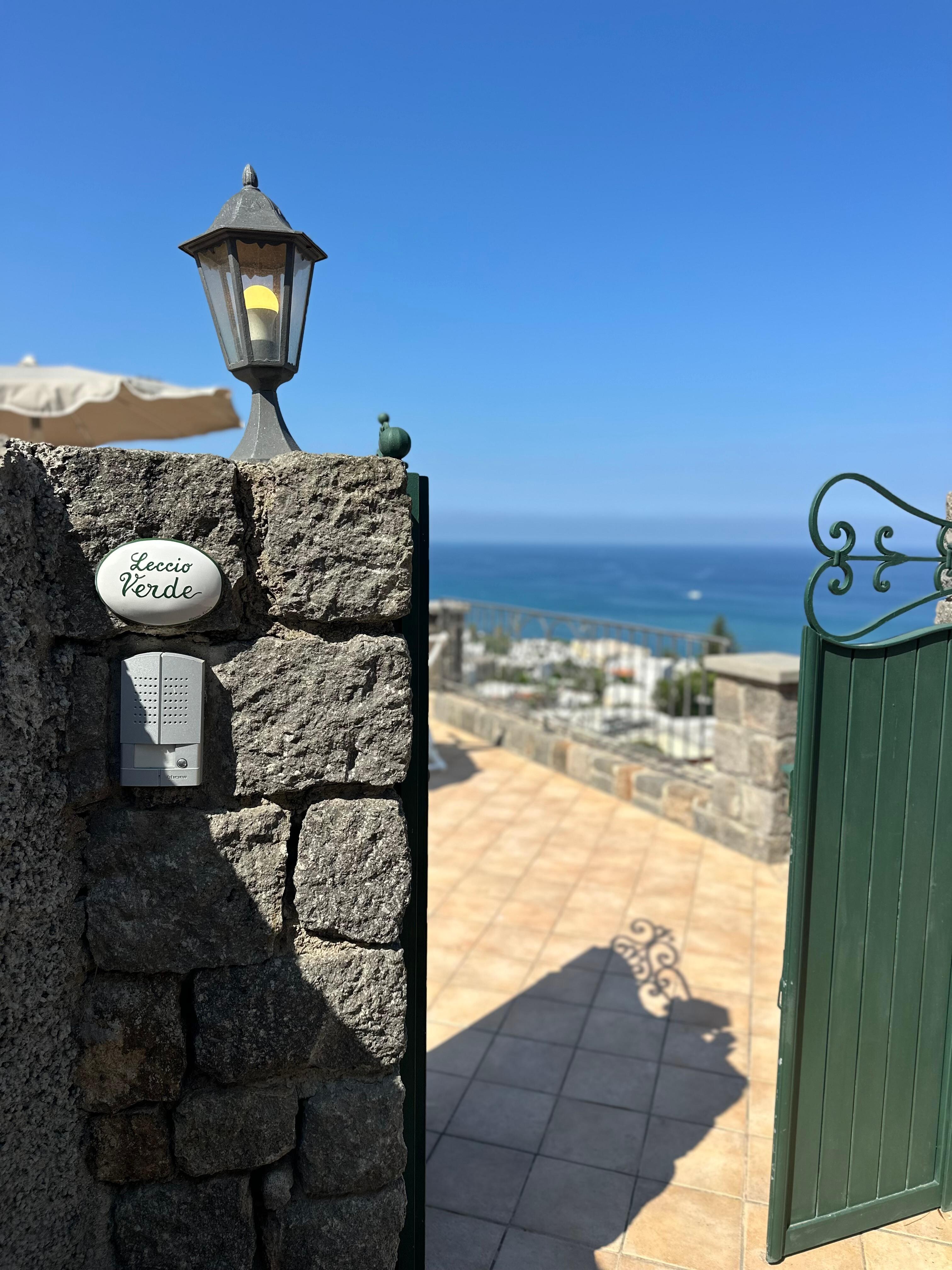 The gate to the villa is on the top floor - walk down a flight to reach the front door.