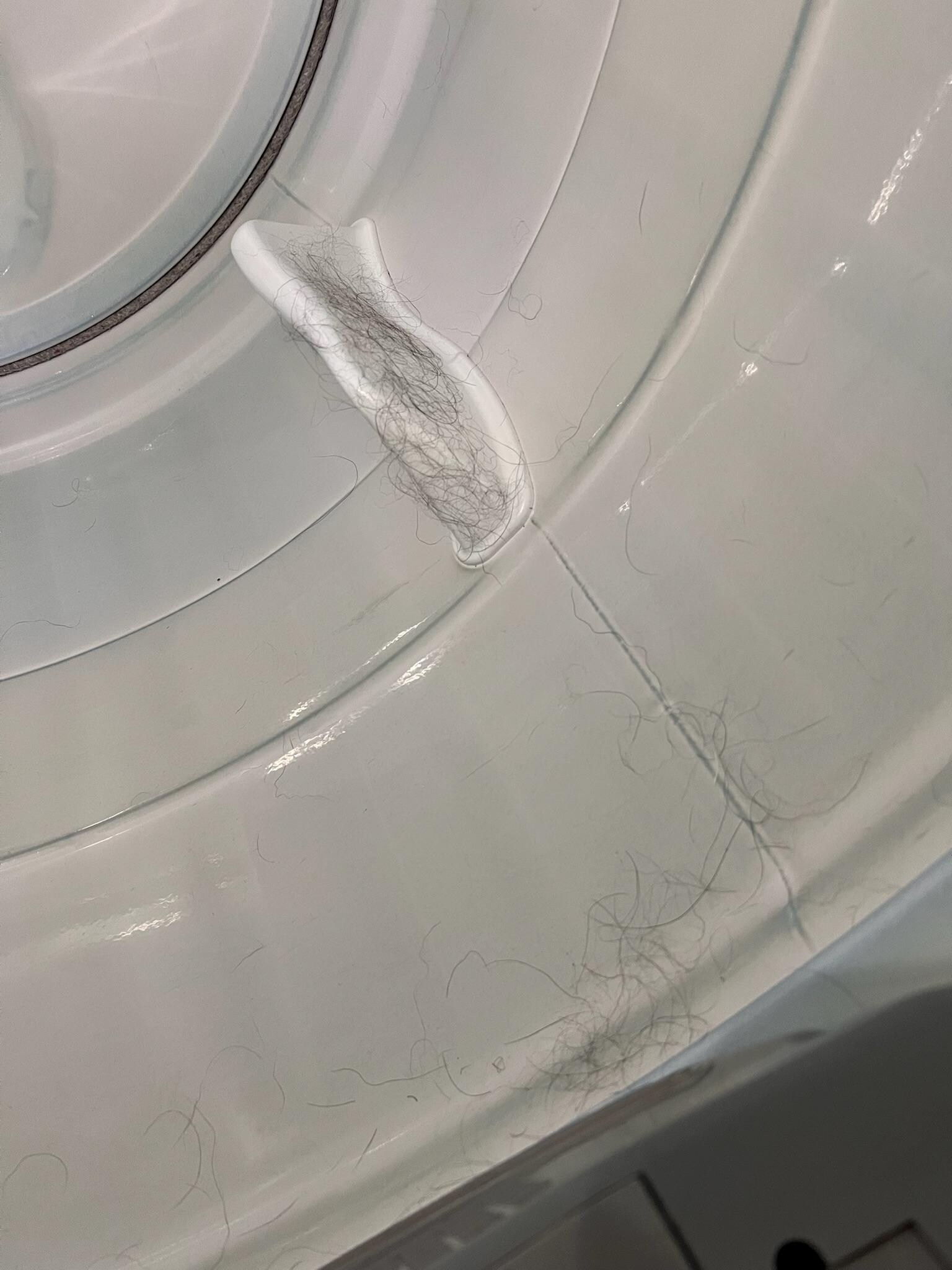 Washing machine coated in pet hair. Gasket is moldy. 
