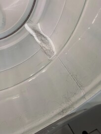 Washing machine coated in pet hair. Gasket is moldy.