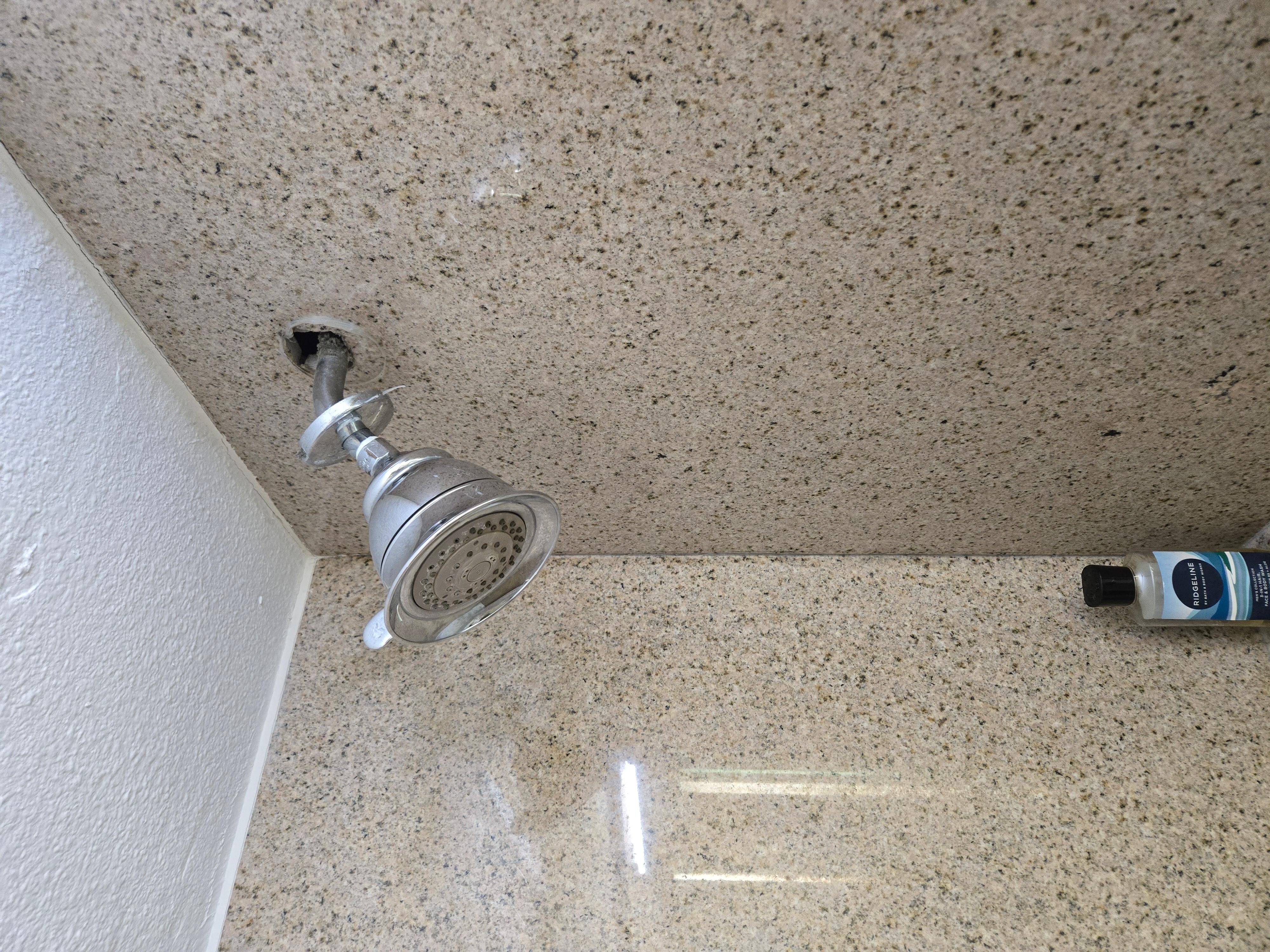 Shower head needs to be secured 